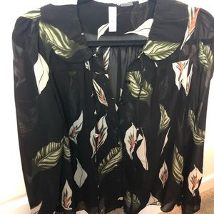 Sheer black blouse with flowers